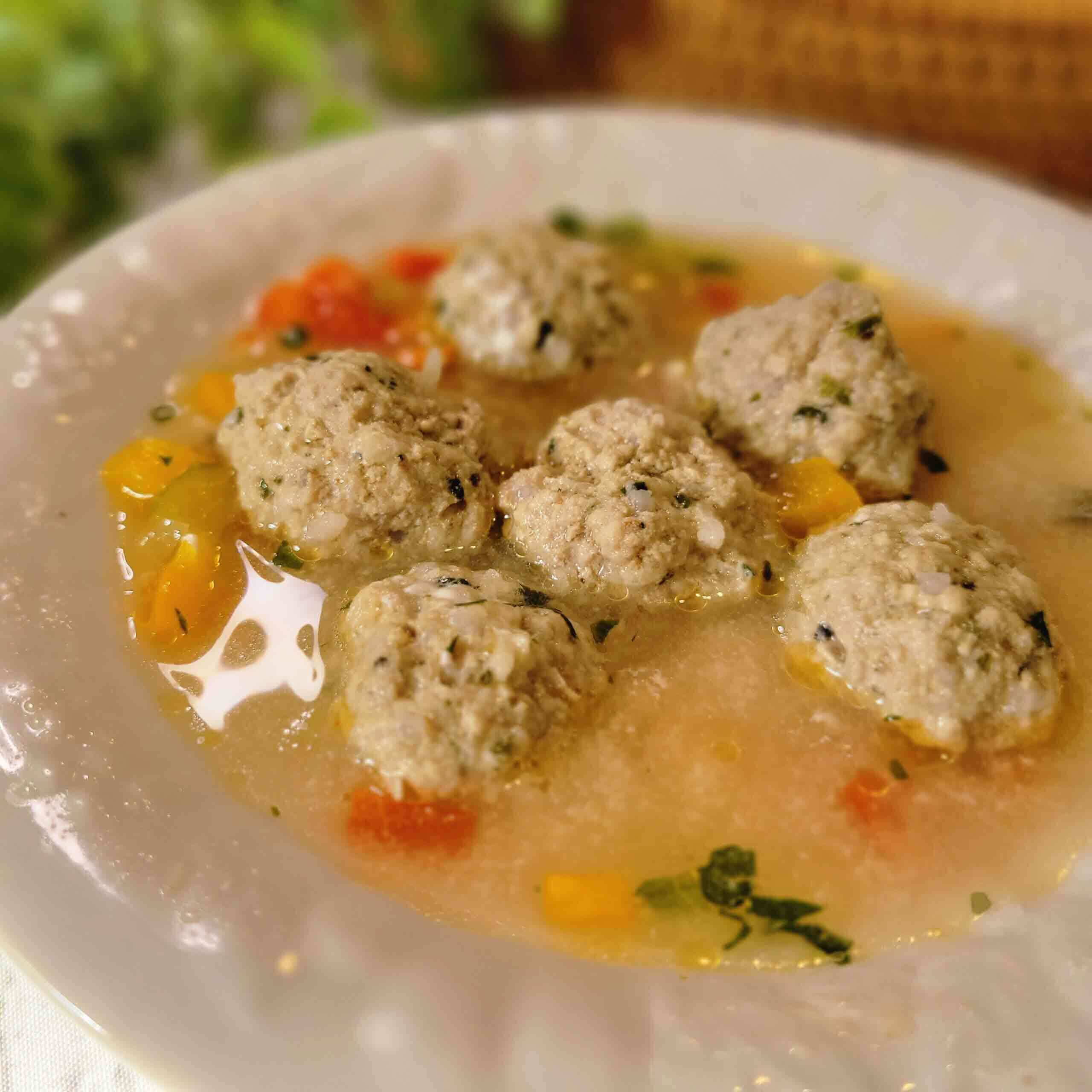 A food blog about Romanian Sour Soup With Meatballs, delicious Swedish meatballs mixed with a warm, light broth.