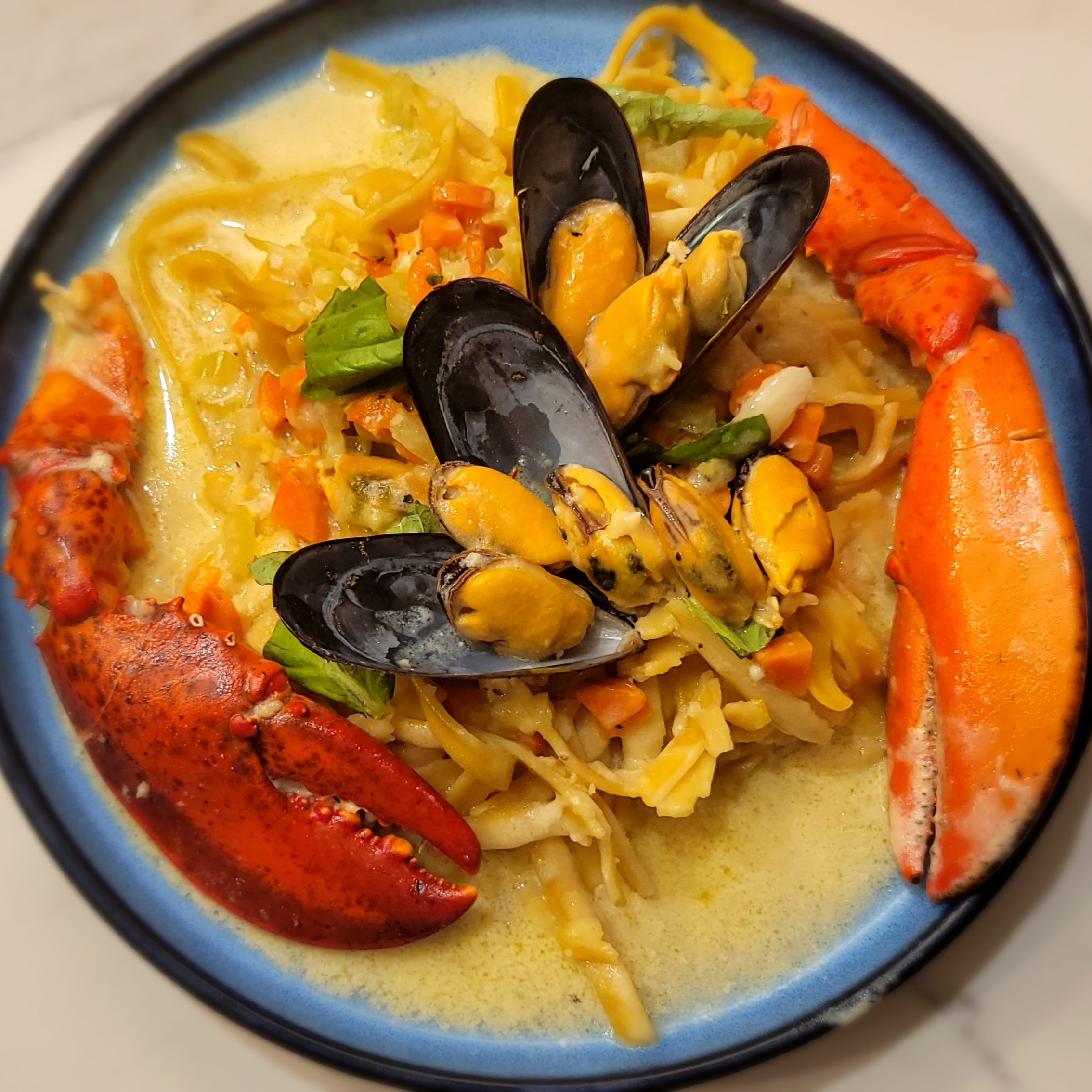 Read more about the article Creamy Mussels & Lobster Fettuccini